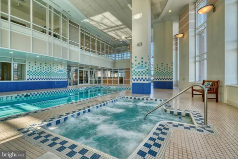 a living room with furniture fireplace and a flat screen tv