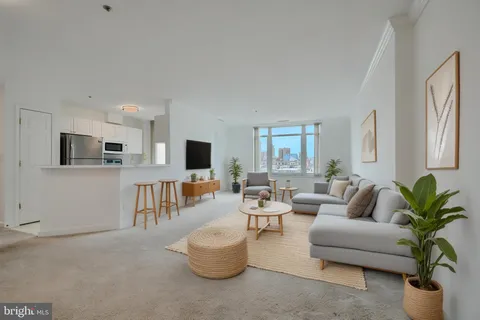 a view of a kitchen with a sink