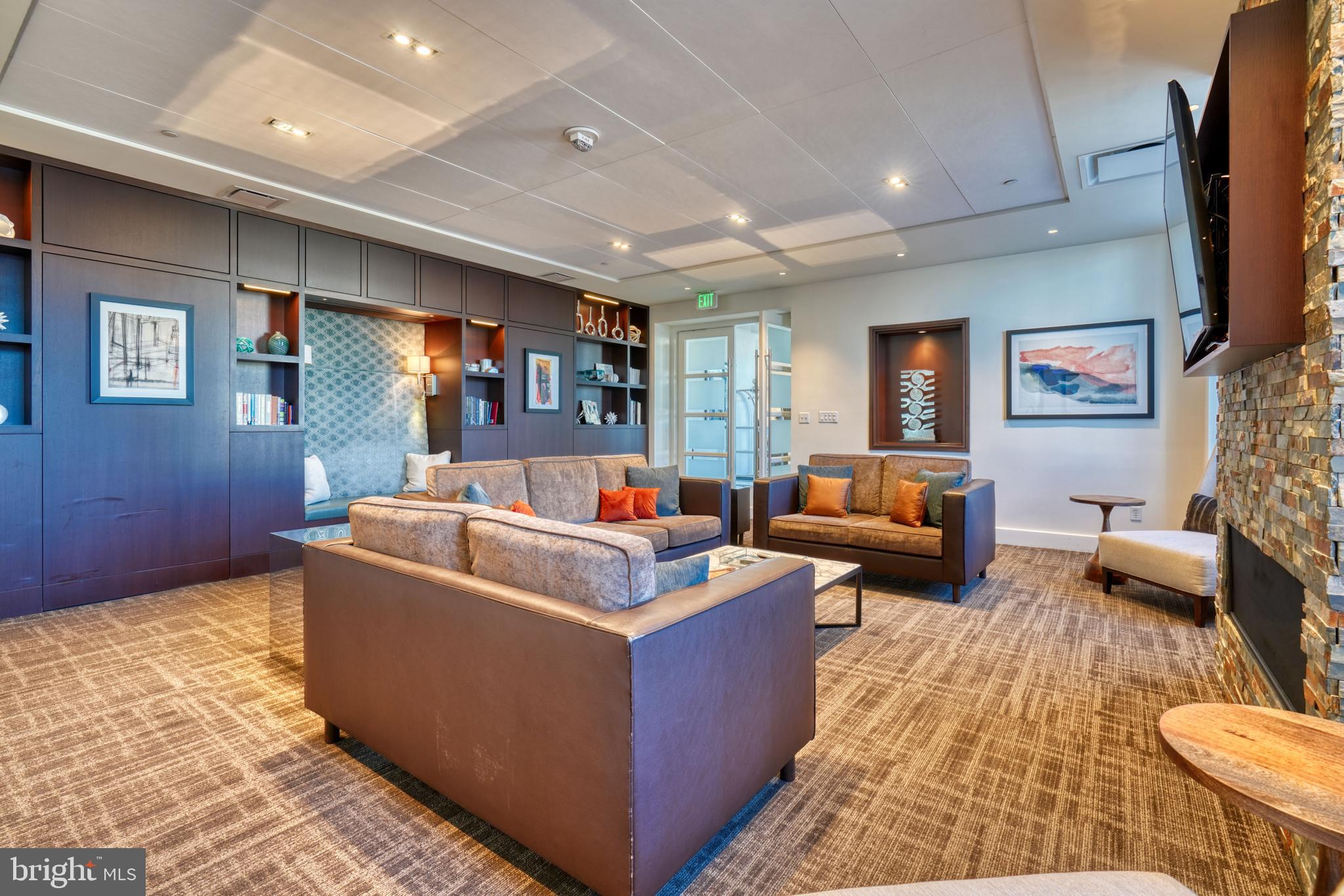 100 Harborview Drive, Unit 609 Baltimore, MD 21230 - Photo 40 of 45 a living room with furniture and a flat screen tv