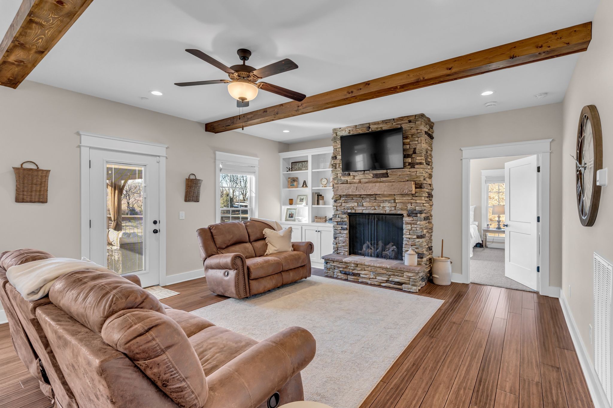 5574 Dowlen Road Cedar Hill, TN 37032 - Photo 14 of 59 a living room with furniture and a fireplace