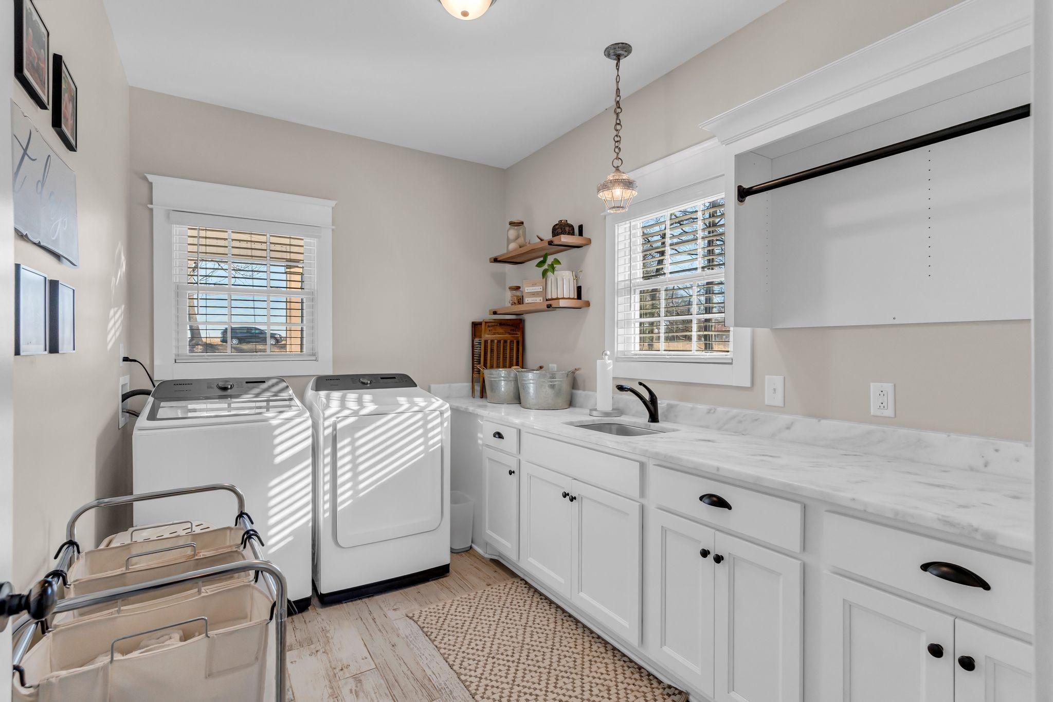 5574 Dowlen Road Cedar Hill, TN 37032 - Photo 23 of 59 a spacious bathroom with a granite countertop sink mirror and window