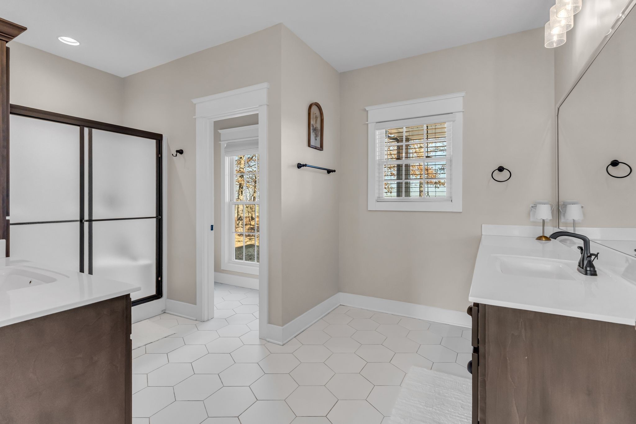 5574 Dowlen Road Cedar Hill, TN 37032 - Photo 27 of 59 a bathroom with a sink and a mirror