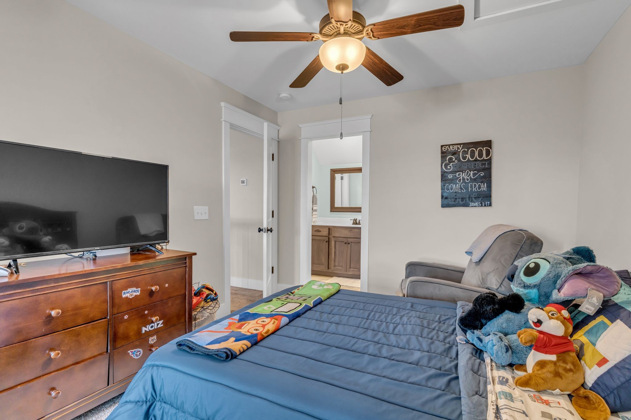 5574 Dowlen Road Cedar Hill, TN 37032 - Photo 35 of 59 a bedroom with a bed and wooden floor