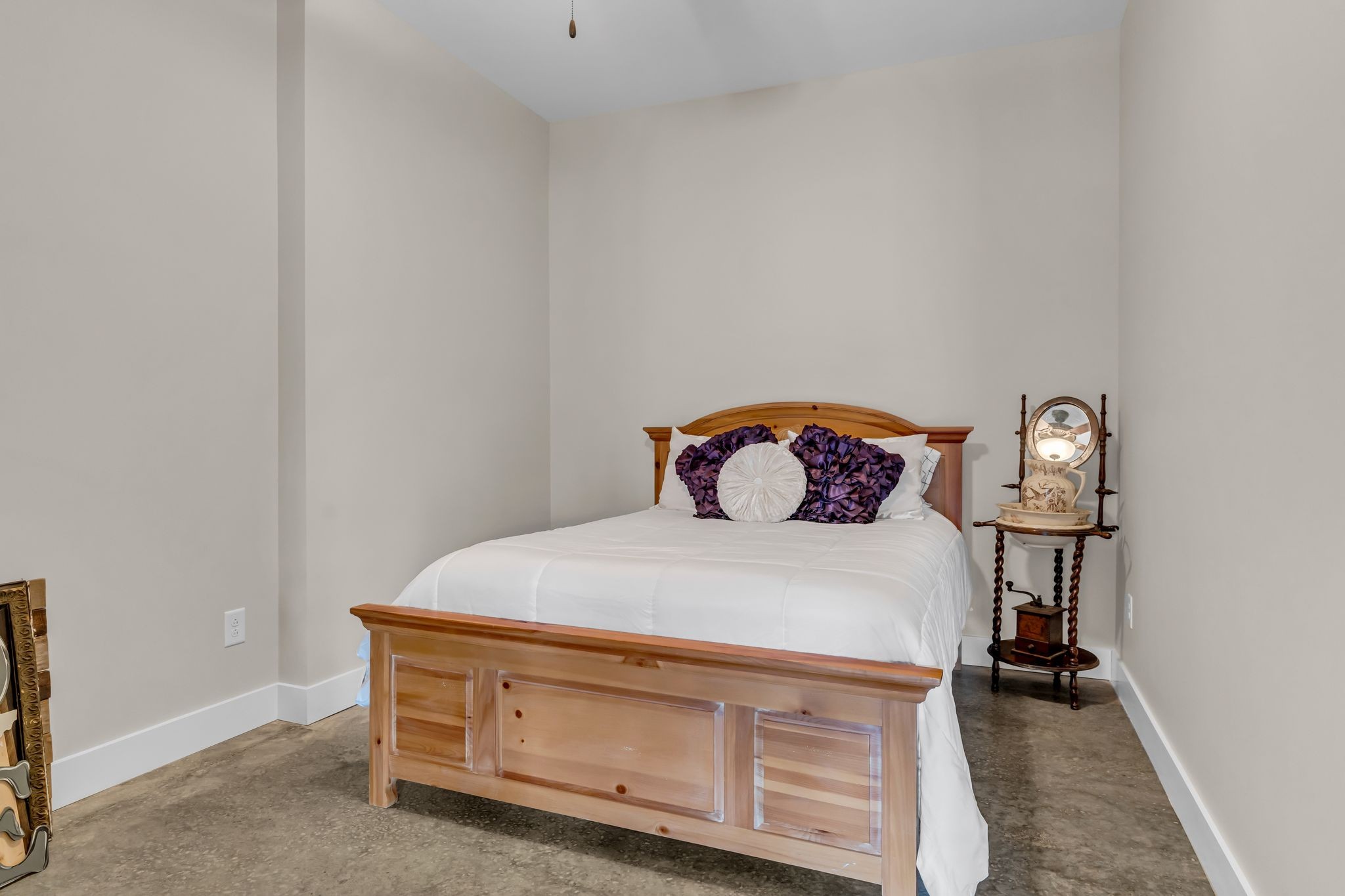 5574 Dowlen Road Cedar Hill, TN 37032 - Photo 41 of 59 a bedroom with a bed and a table