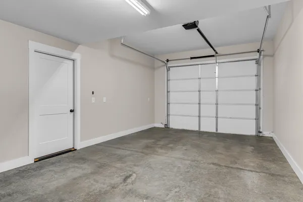 a view of a storage & utility room with a window