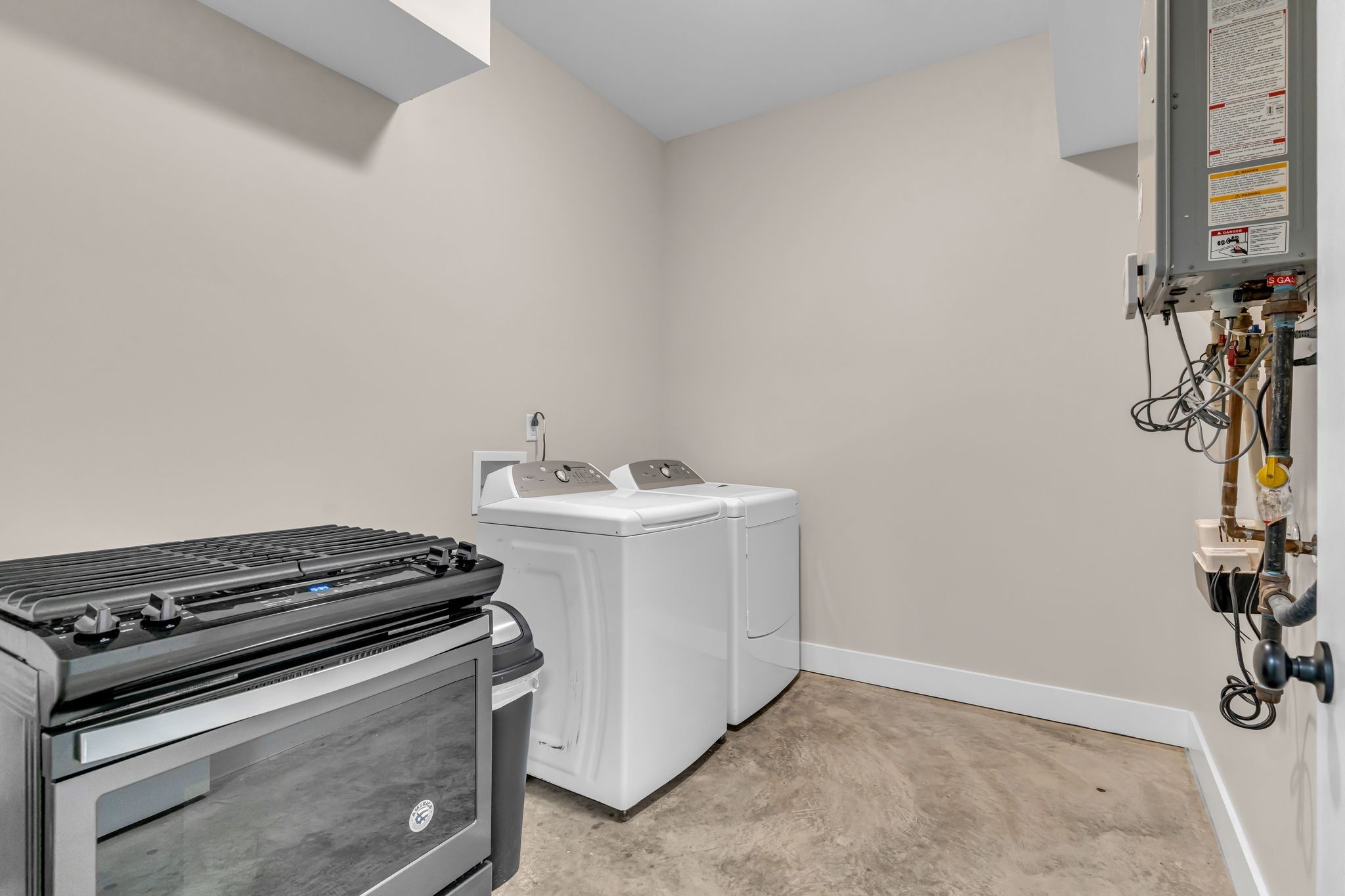 5574 Dowlen Road Cedar Hill, TN 37032 - Photo 47 of 59 a utility room with dryer and washer