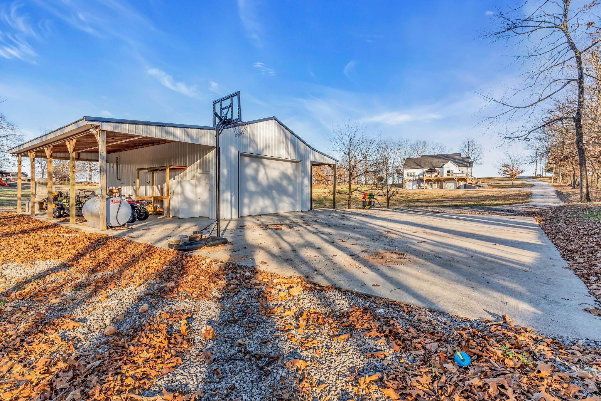 5574 Dowlen Road Cedar Hill, TN 37032 - Photo 55 of 59 a view of a building with a street