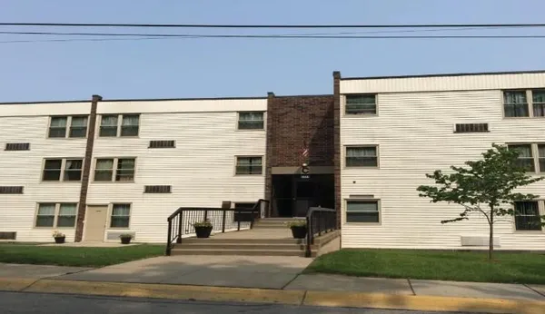 a view of a building with a street