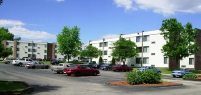 a cars parked in front of a building