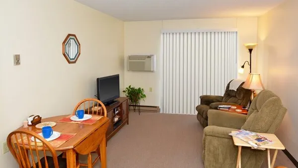 a front view of a house with patio