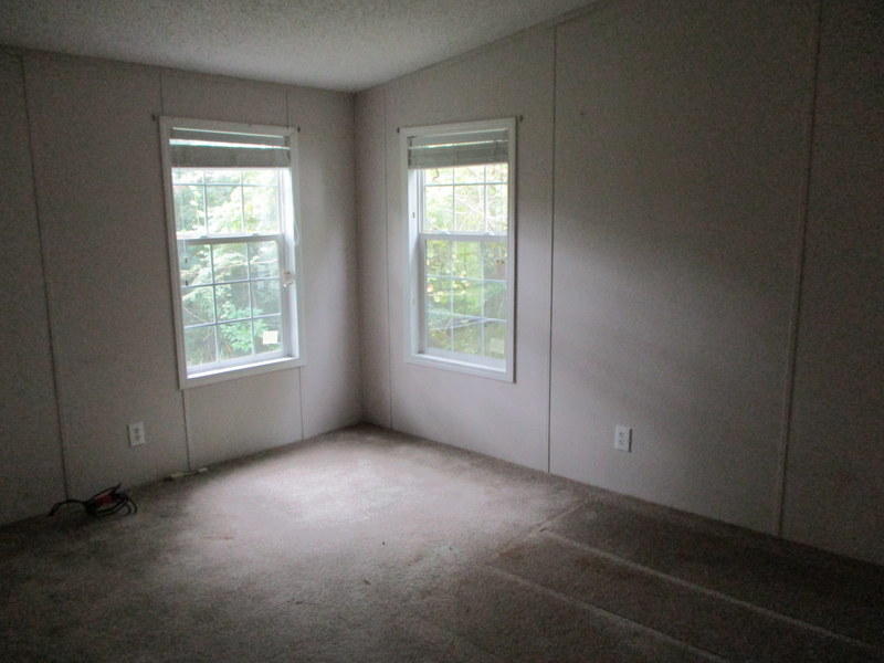 1901 Sexton Road DeFuniak Springs, FL 32433 - Photo 11 of 16 an empty room with a window