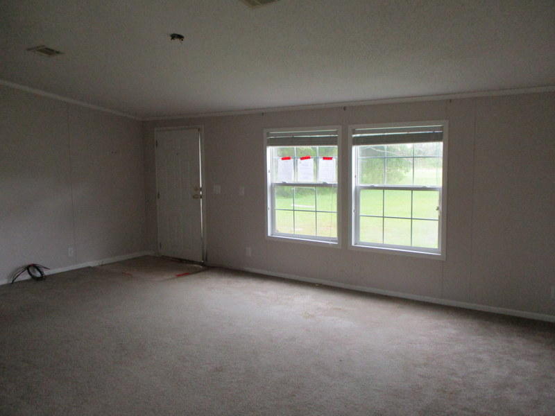 1901 Sexton Road DeFuniak Springs, FL 32433 - Photo 2 of 16 an empty room with windows