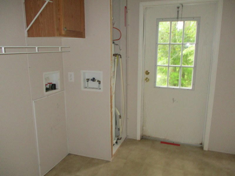 1901 Sexton Road DeFuniak Springs, FL 32433 - Photo 9 of 16 a view of an empty room with a window
