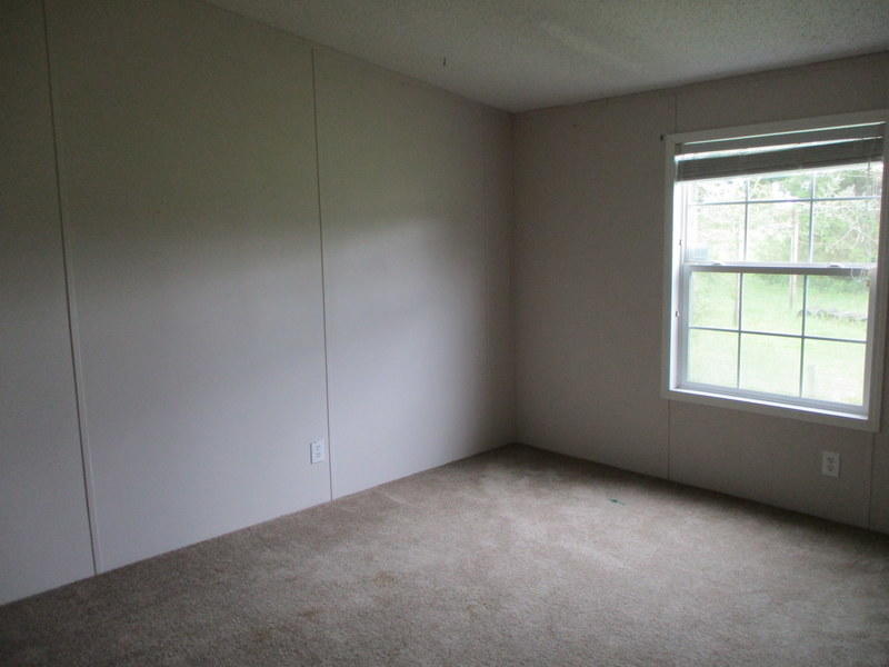 1901 Sexton Road DeFuniak Springs, FL 32433 - Photo 10 of 16 an empty room with a window