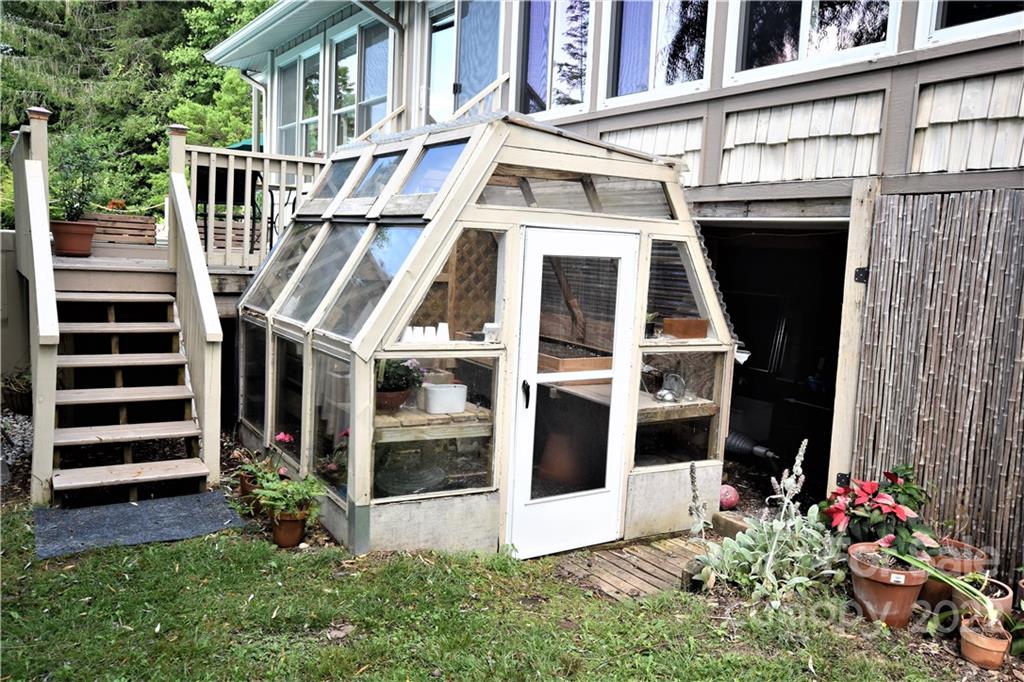 11 Echo Lake Drive Fairview, NC 28730 - Photo 12 of 48 front view of a house with a yard