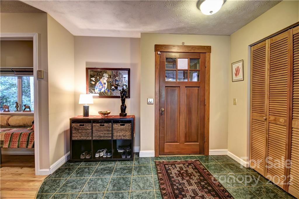 11 Echo Lake Drive Fairview, NC 28730 - Photo 16 of 48 a view of room with furniture and window