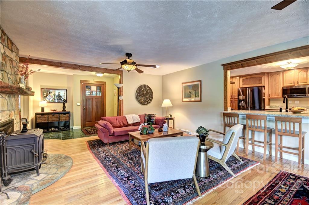 11 Echo Lake Drive Fairview, NC 28730 - Photo 17 of 48 a living room with furniture and a large window