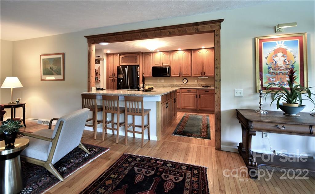 11 Echo Lake Drive Fairview, NC 28730 - Photo 20 of 48 a dining room with furniture and wooden floor