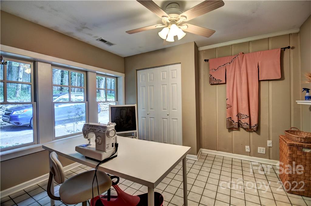 11 Echo Lake Drive Fairview, NC 28730 - Photo 30 of 48 a view of a workspace with furniture and a window