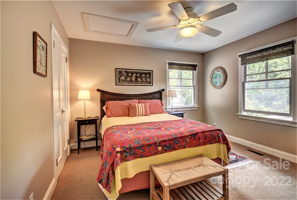 11 Echo Lake Drive Fairview, NC 28730 - Photo 47 of 48 a bedroom with a bed and a window