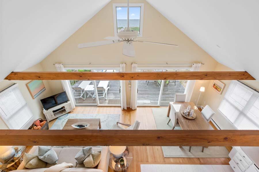 596 Shore Road, Unit 3 Truro, MA 02666 - Photo 23 of 37 a view of living room with furniture and floor to ceiling window
