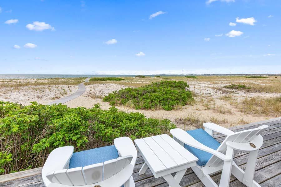 596 Shore Road, Unit 3 Truro, MA 02666 - Photo 29 of 37 a view of an ocean from a balcony