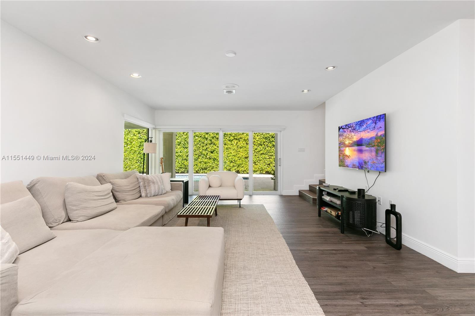 412 Ridgewood Road Key Biscayne, FL 33149 - Photo 15 of 47 a living room with furniture and a large window