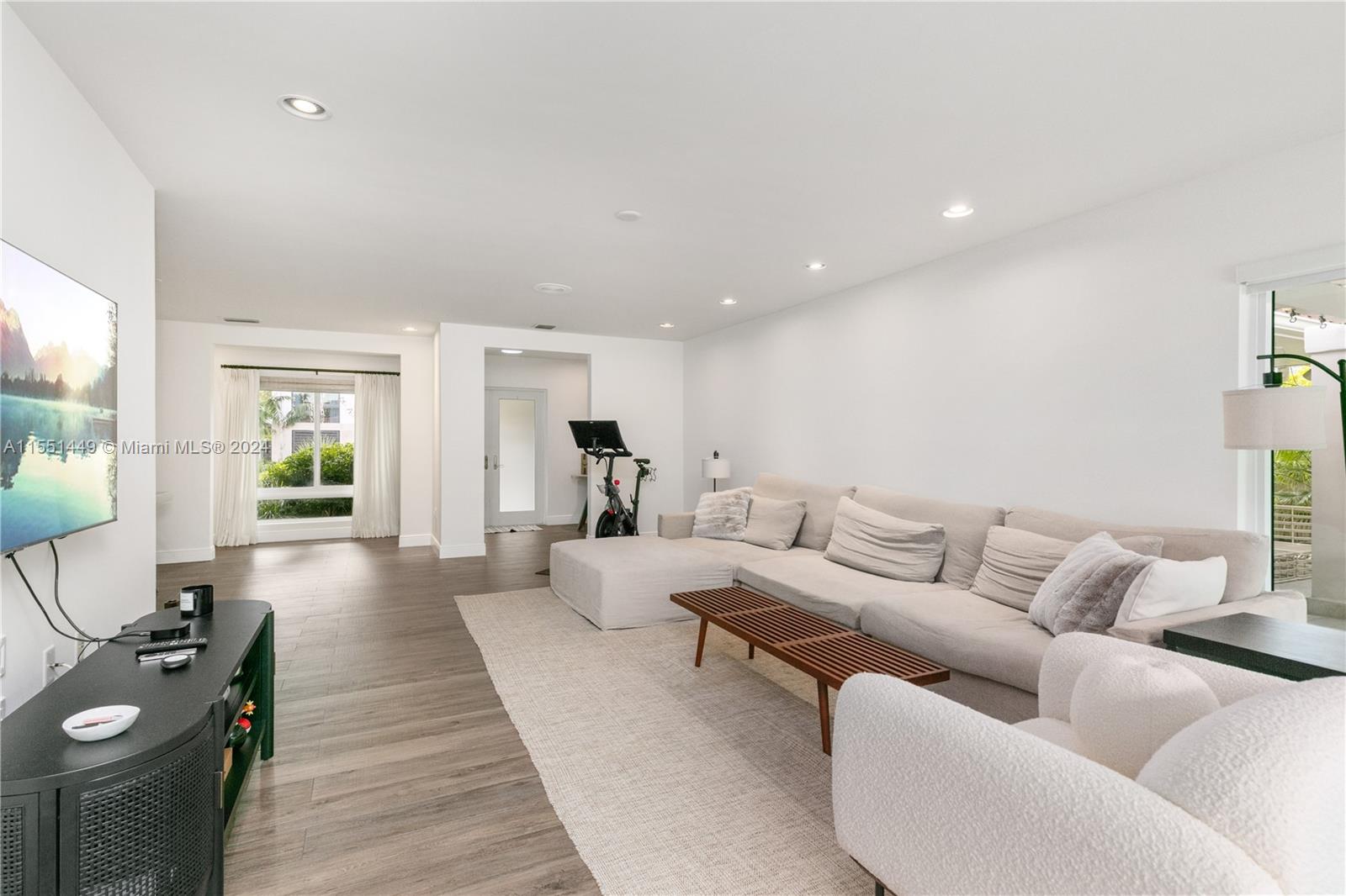 412 Ridgewood Road Key Biscayne, FL 33149 - Photo 16 of 47 a living room with furniture and a wooden floor