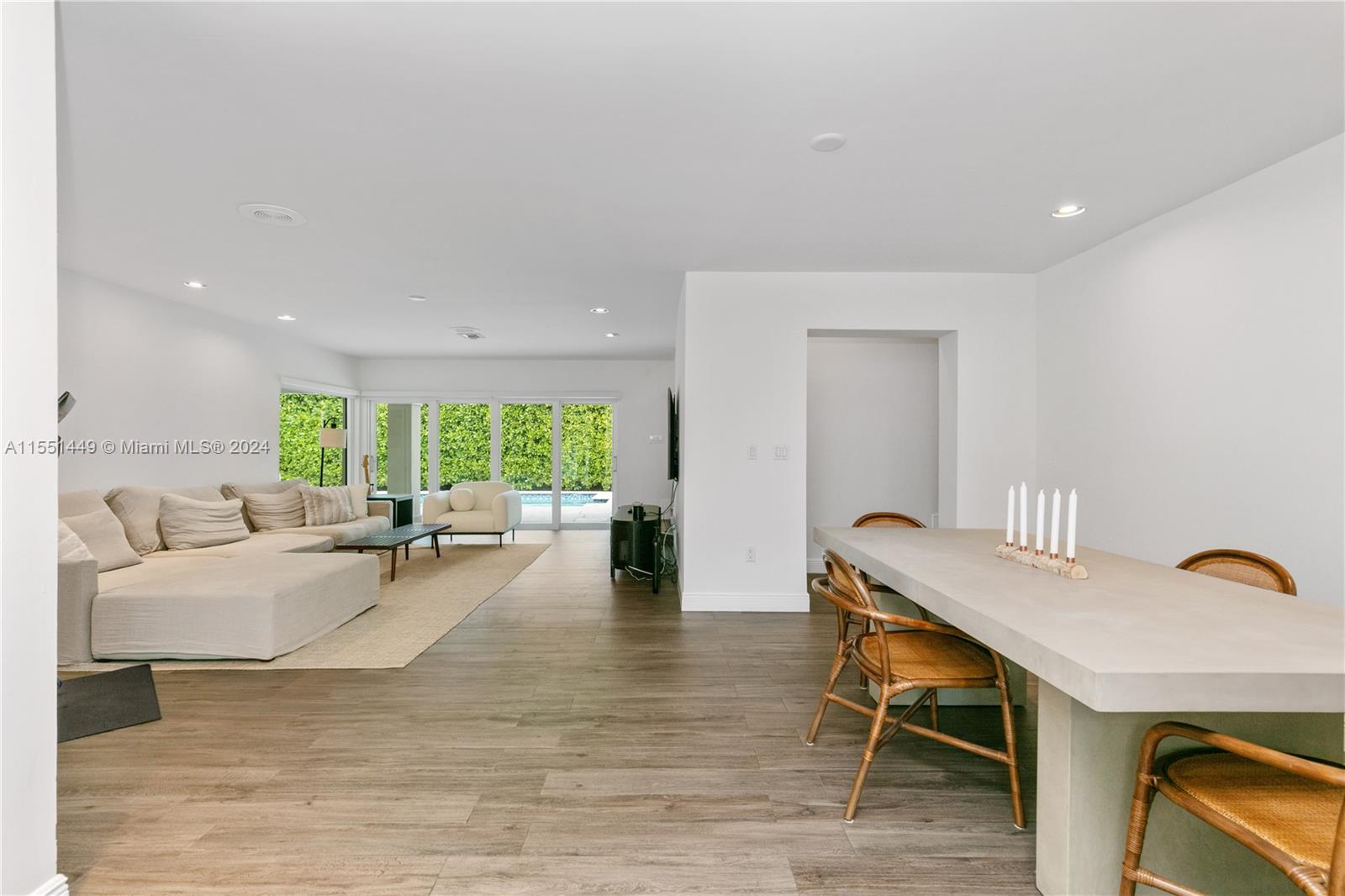 412 Ridgewood Road Key Biscayne, FL 33149 - Photo 18 of 47 a living room with furniture and a large window