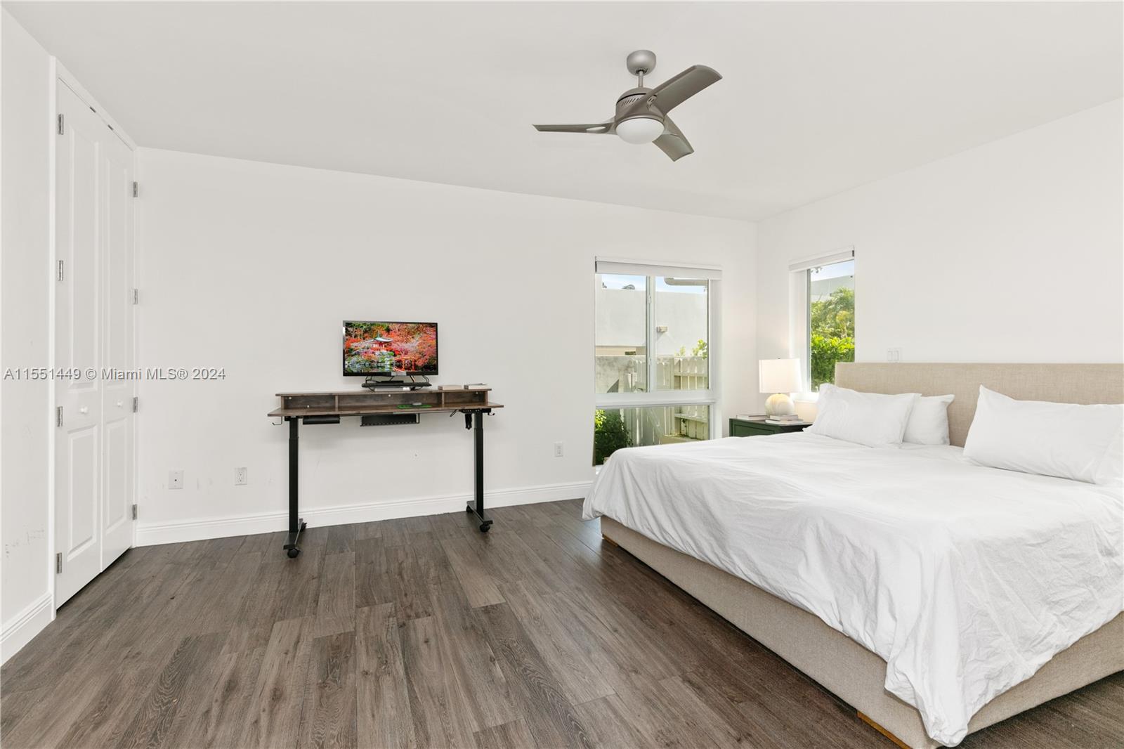 412 Ridgewood Road Key Biscayne, FL 33149 - Photo 32 of 47 a bedroom with a bed and a dresser