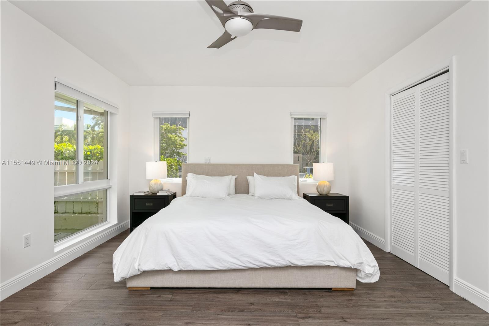 412 Ridgewood Road Key Biscayne, FL 33149 - Photo 33 of 47 a large white bed in a white room