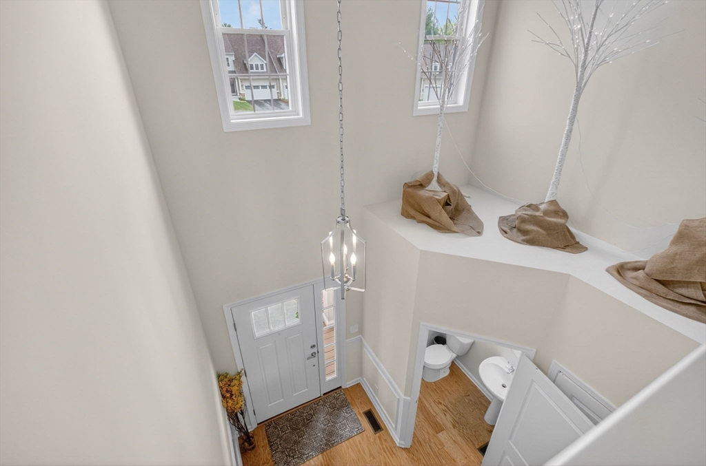 87 Shannon Way, Unit 86 Upton, MA 01568 - Photo 28 of 36 a bathroom with a sink and a mirror