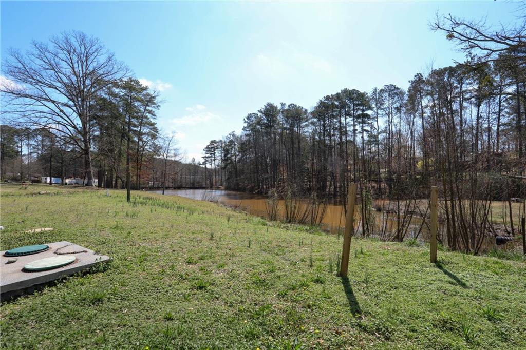 3602 Jones Mill Road Peachtree Corners, GA 30360 - Photo 25 of 35 a view of a backyard with a garden