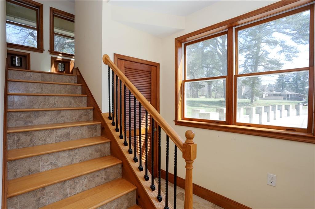 3602 Jones Mill Road Peachtree Corners, GA 30360 - Photo 10 of 35 a view of staircase with large window