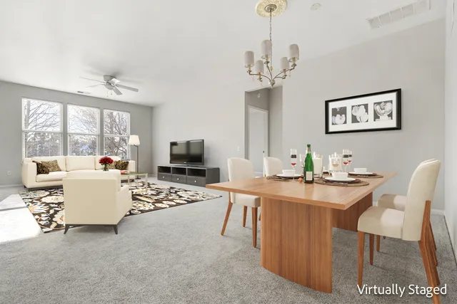 a view of a dining room with furniture window and outside view