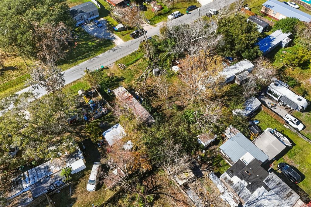 351 Exeter Street Orlando, FL 32820 - Photo 16 of 20 an aerial view of a house with a yard