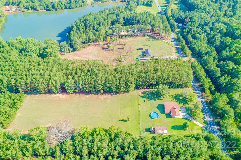 8264 Lockhart Road Sharon, SC 29742 - Photo 29 of 46 a view of a lake with a yard