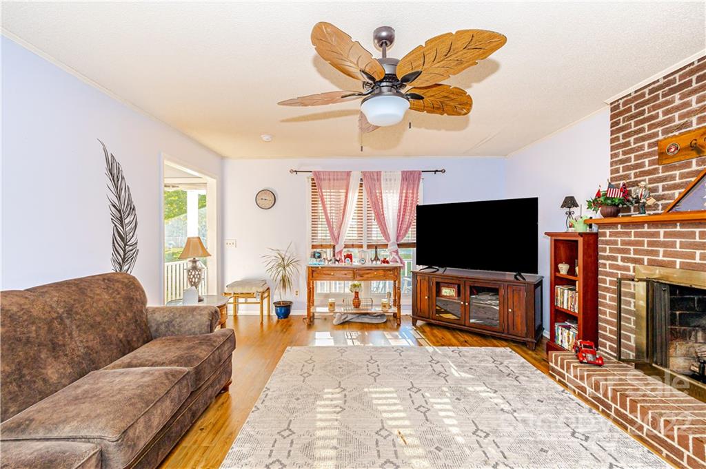 8264 Lockhart Road Sharon, SC 29742 - Photo 5 of 46 a living room with furniture and a flat screen tv