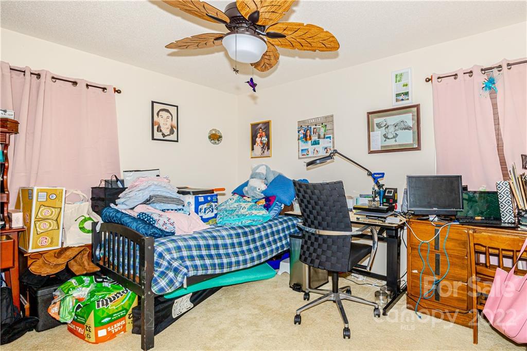 8264 Lockhart Road Sharon, SC 29742 - Photo 8 of 46 a bedroom with a workspace