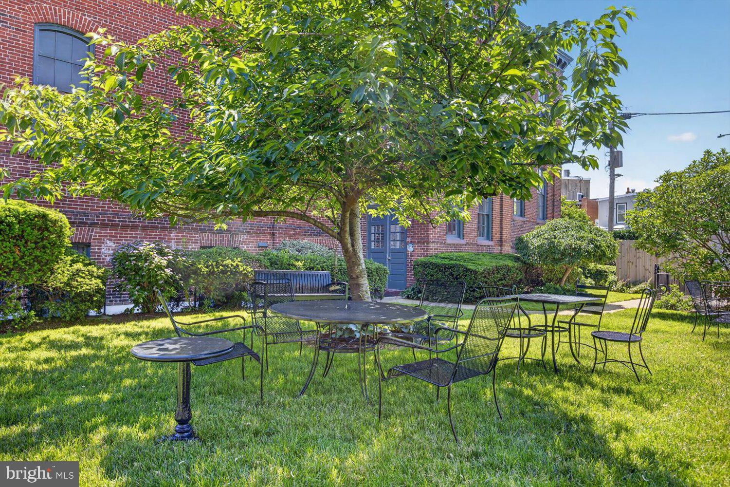 410 5th Street Northeast, Unit 1 Washington, DC 20002 - Photo 37 of 37 Shaded garden retreat with seating.