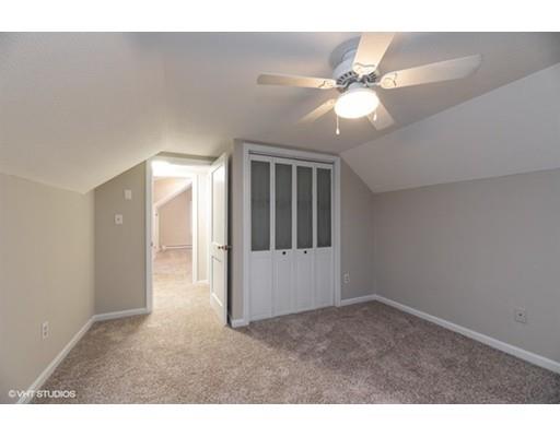 119 White Oak Road Springfield, MA 01128 - Photo 19 of 21 a view of an empty room with window and chandelier fan