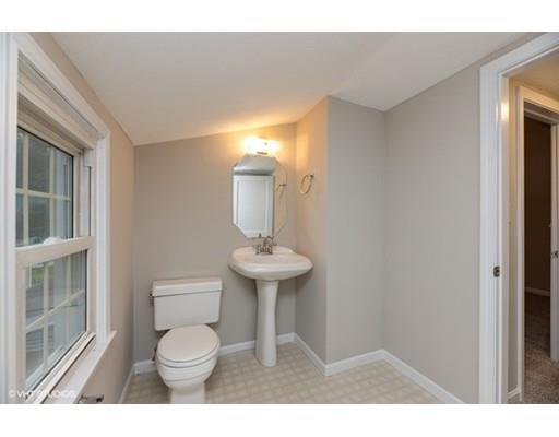 119 White Oak Road Springfield, MA 01128 - Photo 20 of 21 a bathroom with a toilet a sink and mirror