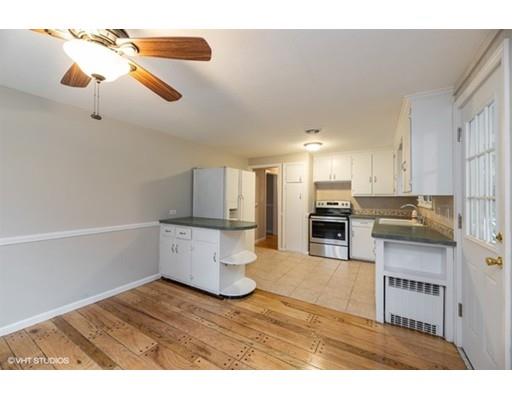 119 White Oak Road Springfield, MA 01128 - Photo 4 of 21 a kitchen with stainless steel appliances granite countertop a refrigerator a stove and a sink