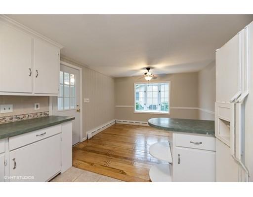 119 White Oak Road Springfield, MA 01128 - Photo 7 of 21 a kitchen with granite countertop a sink window and cabinets