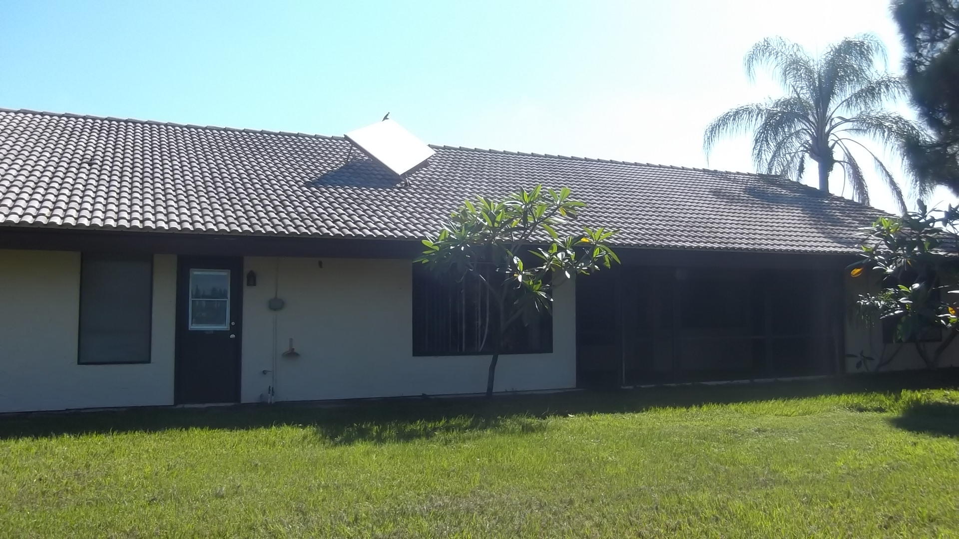 2189 Southeast Erwin Road Port St. Lucie, FL 34952 - Photo 1 of 14 REAR
