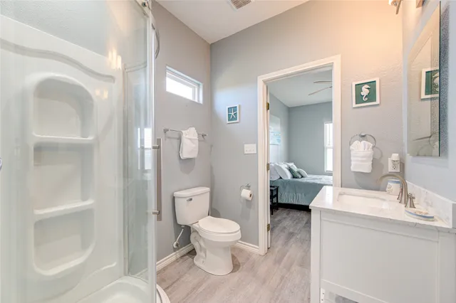 a living room with a toilet and a sink