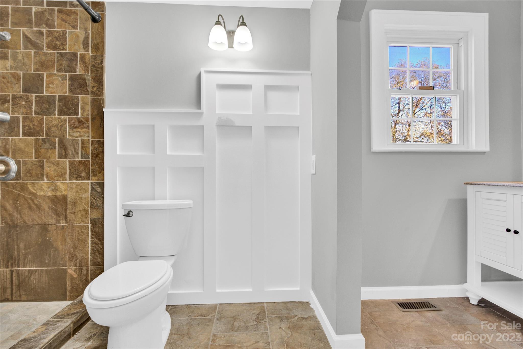 201 Knox Street Clover, SC 29710 - Photo 19 of 34 a bathroom with a toilet and a sink