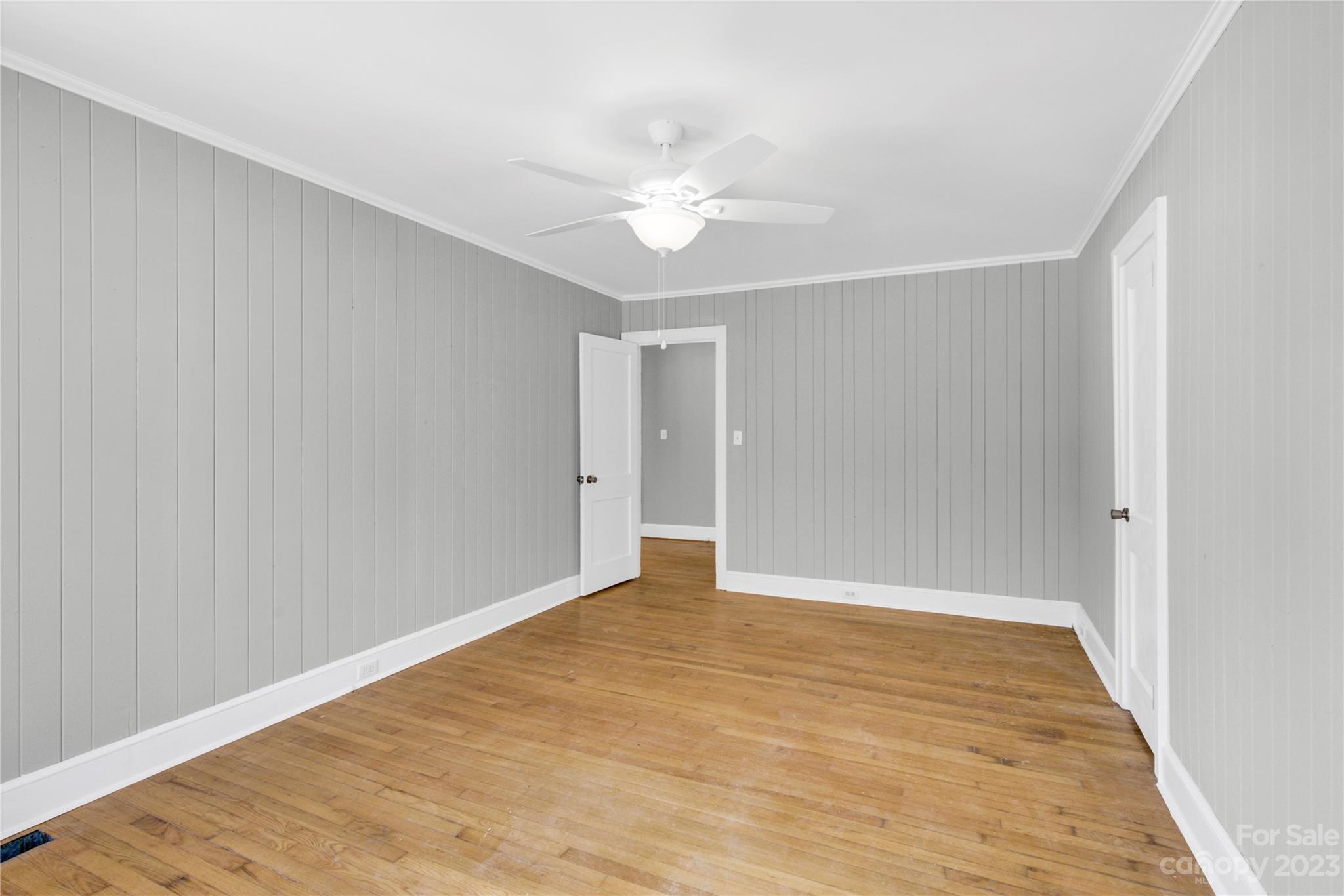 201 Knox Street Clover, SC 29710 - Photo 23 of 34 a view of an empty room with wooden floor