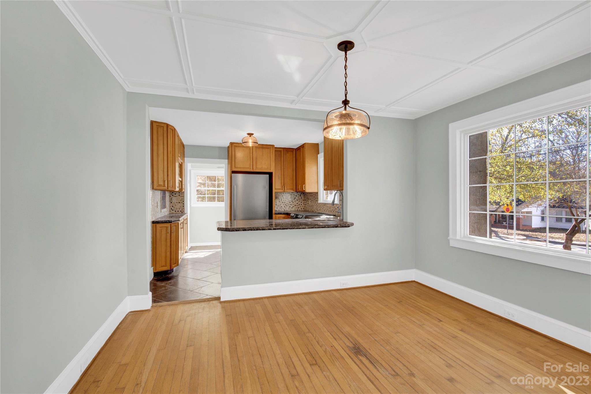 201 Knox Street Clover, SC 29710 - Photo 9 of 34 a view of a room with wooden floor fireplace and windows