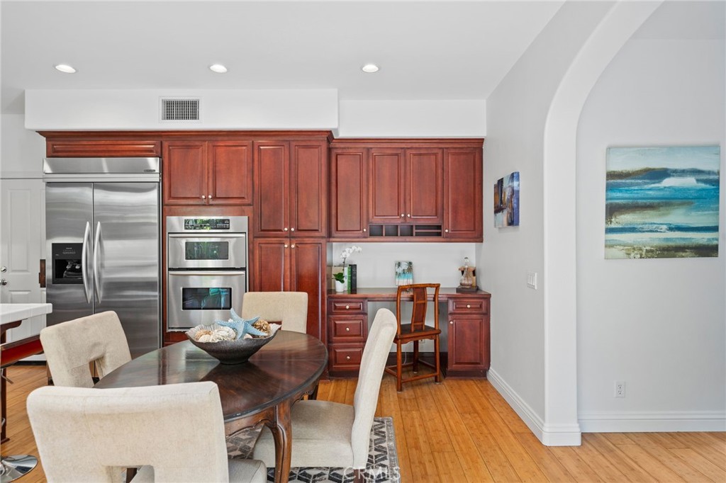 40 Waterspout Irvine, CA 92620 - Photo 11 of 40 a workspace with furniture and wooden floor